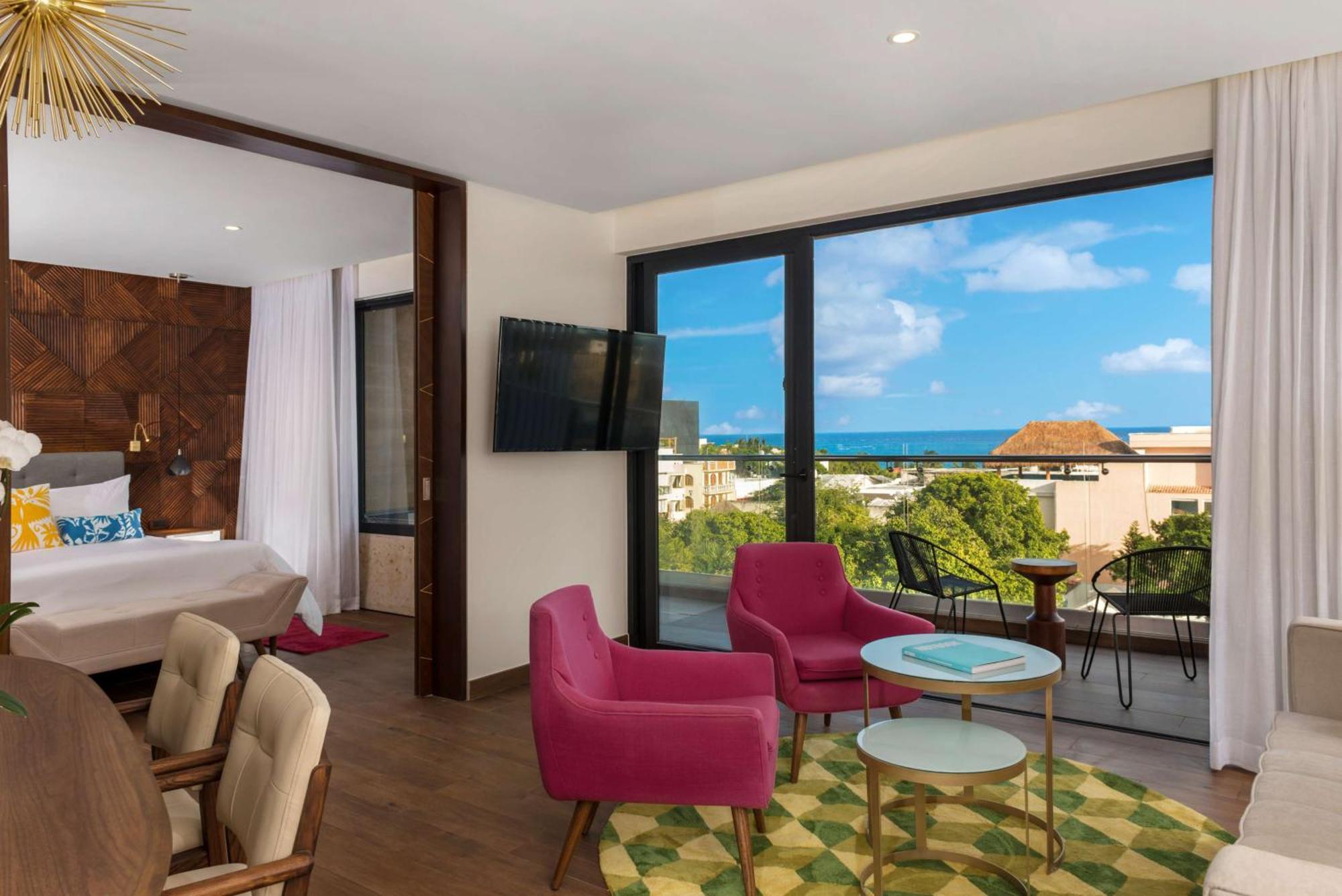 Suite King con 1 Camera da Letto e Vista Oceano Parziale